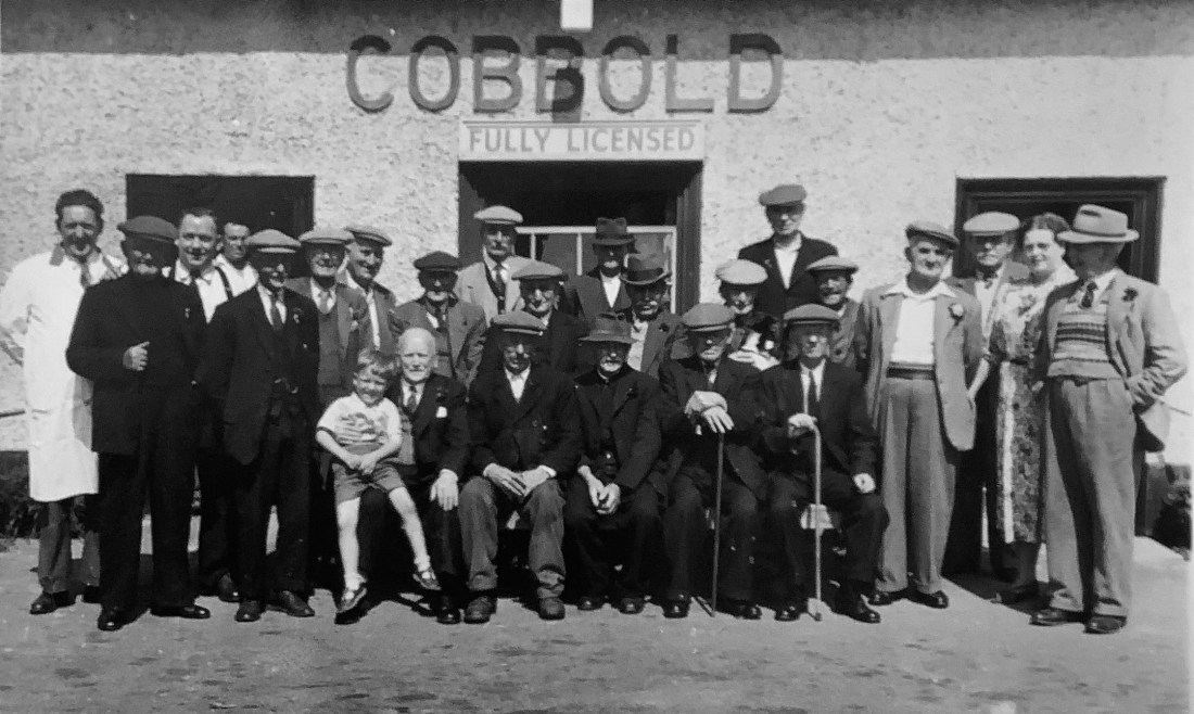 Hand celebrates- everyone outside the pub